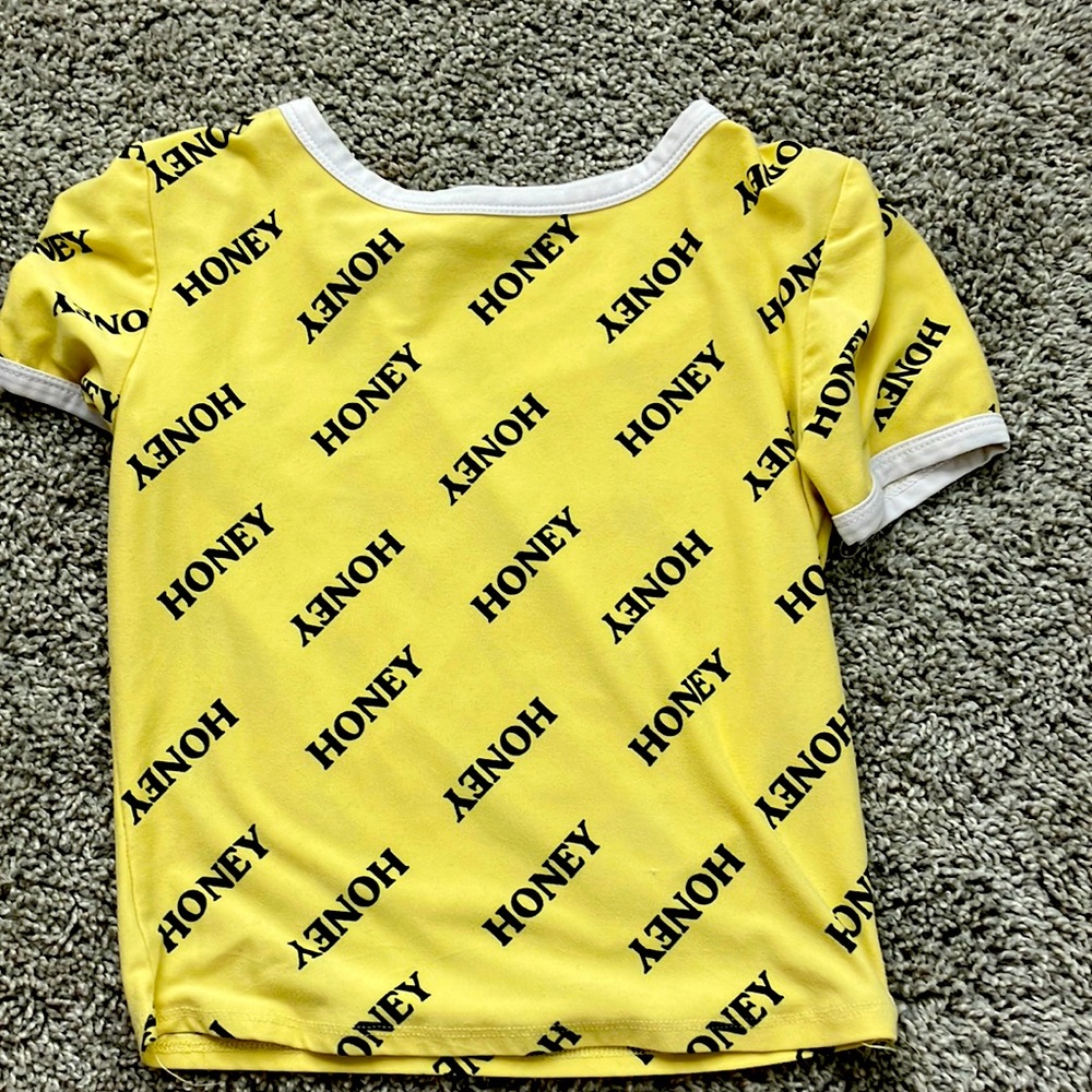The two are StreetWear Society crop tops. They are both small.